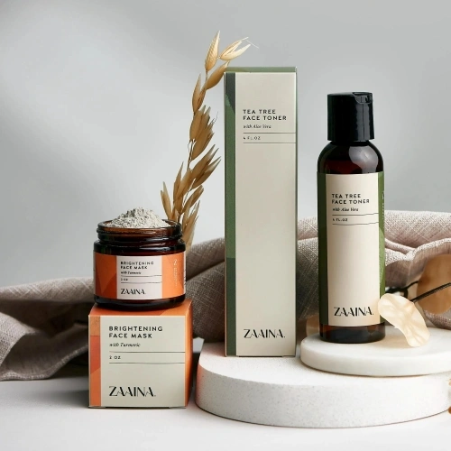 Face toner boxes with inserts for secure bottle placement and protection